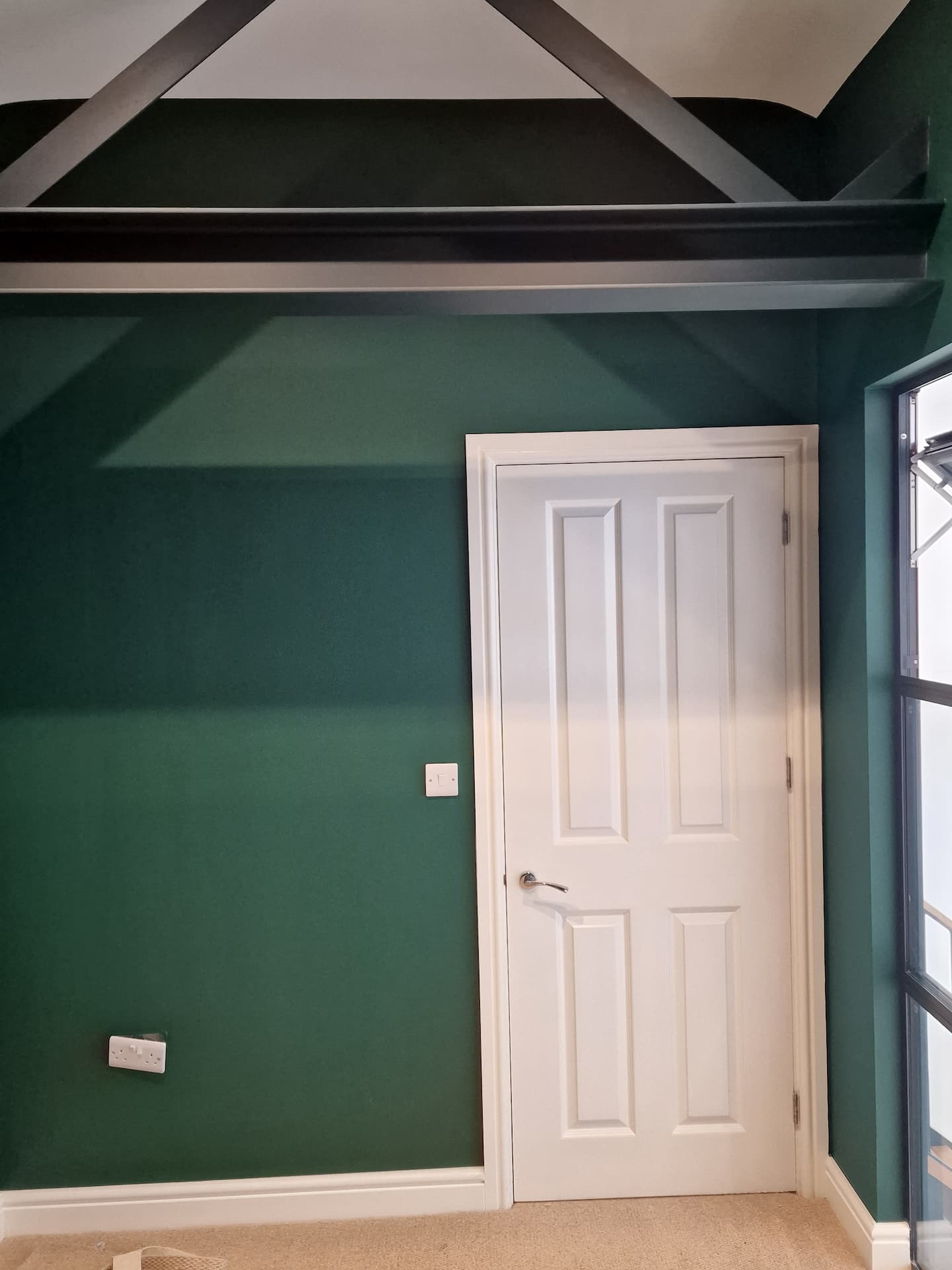 Photo of a room in Winchester, painted and decorated green and white by OA Interior Decor.